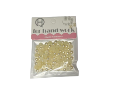 Dekoratyviniai perliukai puselės gelsvos sp. 8mm 110vnt